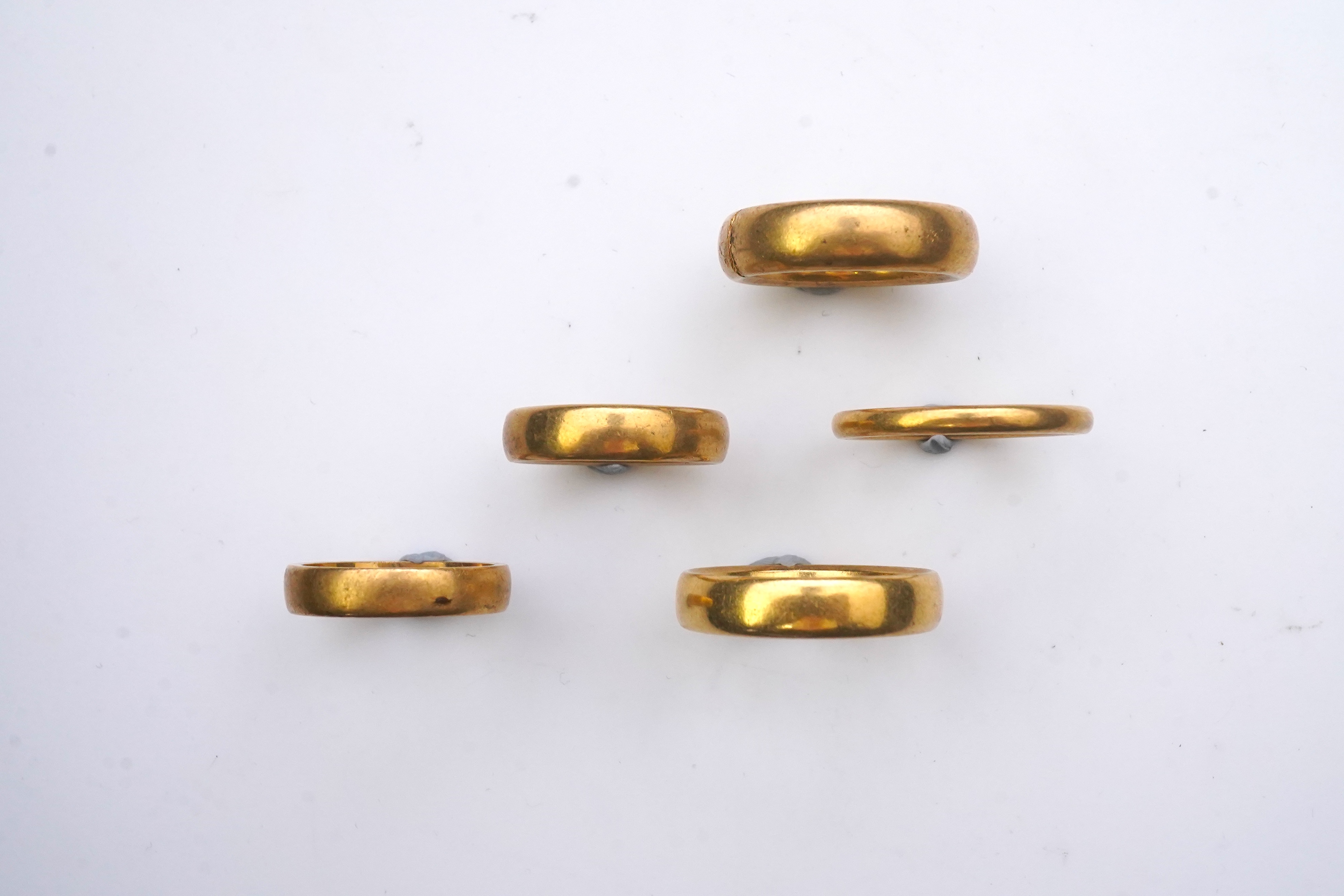 Five 22ct gold wedding bands